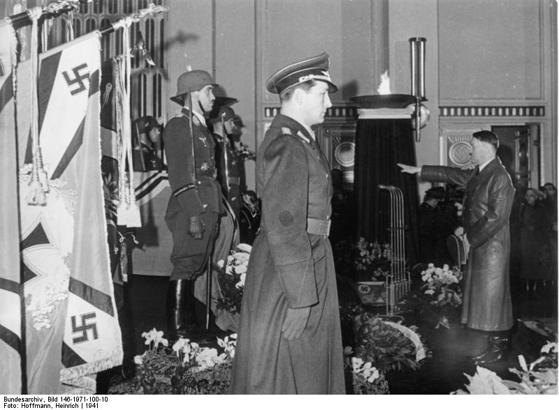Adolf Hitler salutes at the funeral of Ernst Udet